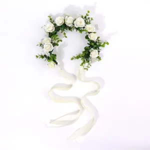 Exquisite white camellia floral crown hair accessory with long ribbons, perfect for bridal wedding.