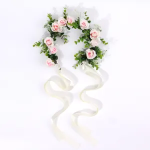 Bohemian bridal flower crown with pink roses and white ribbons for wedding and vacation.