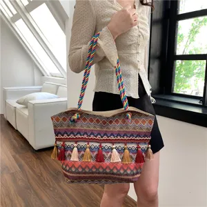 Boho woven tote bag with colorful straps and tassels, large capacity casual shoulder bag.