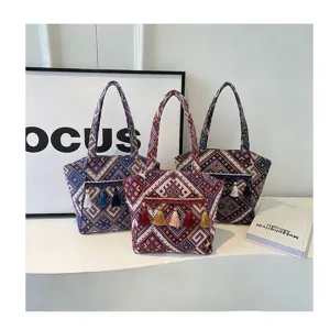 Ethnic woven tote bag with tassels, large capacity vintage shoulder handbag for women.