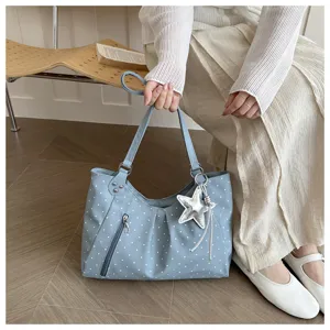Korean style blue polka dot shoulder bag with stylish star pendant, spacious tote design.