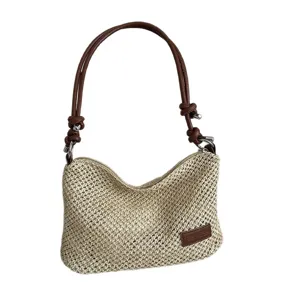 Woven straw shoulder bag for women, casual summer beach hobo handbag with brown leather strap.