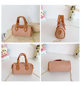 Kids mini barrel bag with chic chain strap, cute shoulder cross body handbag for girls boys.