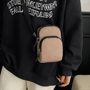 Stylish women's small crossbody phone bag, casual canvas checkered design with secure zipper.