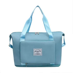 Large capacity foldable travel duffel bag for women, short trips, gym, and yoga storage.