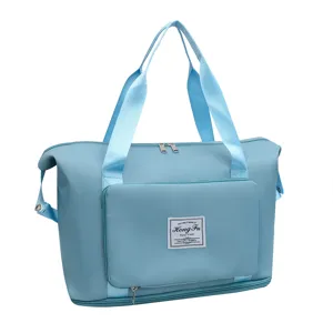Large capacity travel duffel bag with durable handles and foldable design for gym and trips.
