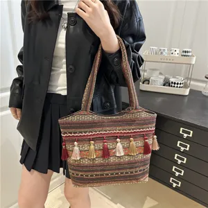 Ethnic woven tote bag with colorful tassels, large capacity casual shoulder bag for women.