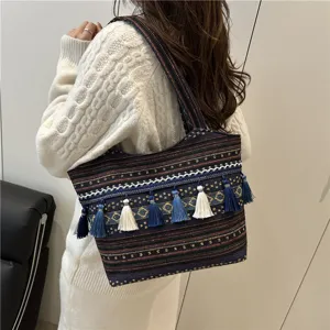 Ethnic woven tote bag with colorful tassels, large capacity casual shoulder bag for daily use.