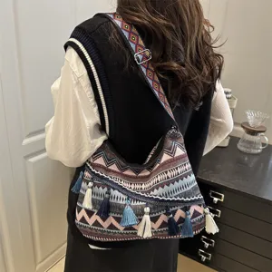 Bohemian ethnic style tassel shoulder bag with geometric striped pattern for casual daily use.