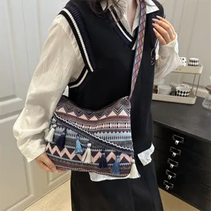 Ethnic fringe shoulder bag for women, casual geometric pattern crossbody tote bag with tassels.
