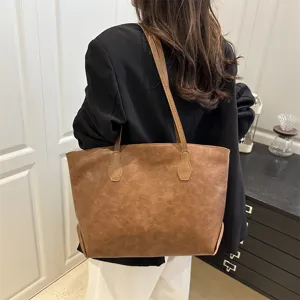 Women vintage PU large capacity shoulder tote bag, stylish commuting handbag for daily use.