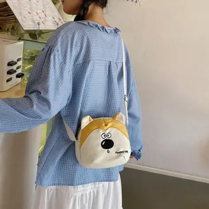 Cute cartoon dog children shoulder bag, yellow and white design, casual crossbody bag for kids.