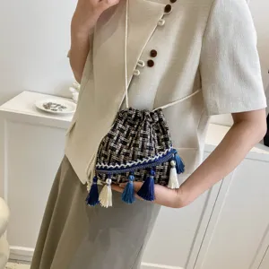Woven tweed bucket bag with colorful tassels, ethnic style crossbody bag for women daily.