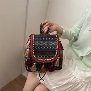 Bohemian ethnic style casual backpack with retro diamond print, tassels and woven details.