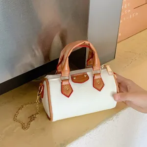 Kids mini Boston bag stylish chain shoulder handbag cute children fashion accessory.