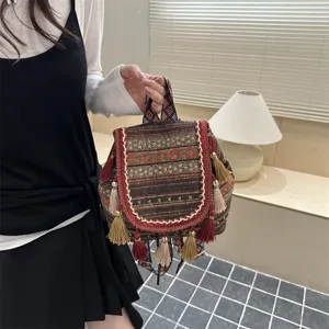 Ethnic style backpack for women, casual woven geometric print bookbag with tassels and straps.