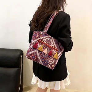 Ethnic style woven tote bag with colorful tassels, large capacity retro shoulder bag for women.