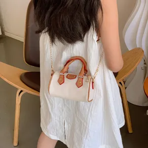 Kids mini shoulder pillow bag with chain strap, stylish trendy crossbody handbag for girls.