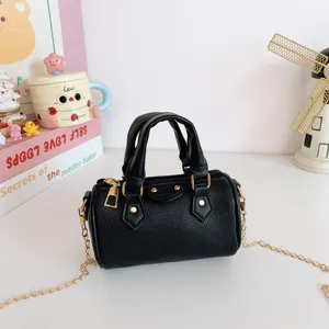 Kids mini black leather shoulder handbag with gold metal chain strap for girls and daily wear