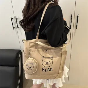 Khaki canvas tote bag with cute bear print and round pouch, casual shoulder bag for women.