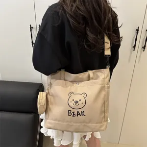 Casual beige canvas tote bag with cute bear print and small coin purse for daily use
