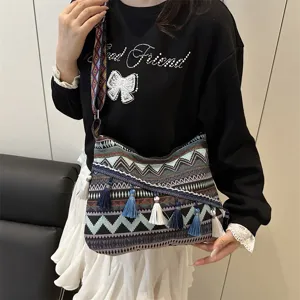 Ethnic style canvas shoulder bag for women, retro geometric tassel casual tote handbag.