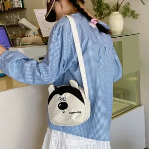 Cute cartoon puppy canvas cross-body bag for children, stylish and lightweight daily shoulder bag.