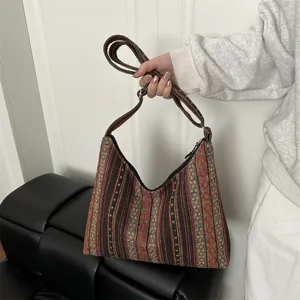 Ethnic woven shoulder bag for women featuring a spacious compartment and retro geometric pattern.