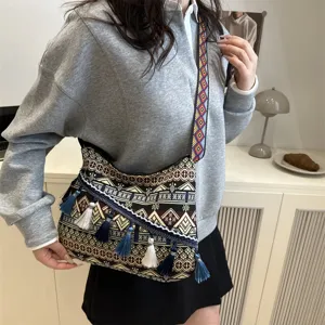 Ethnic style tassel shoulder bag with geometric strap and woven pattern for daily casual wear.