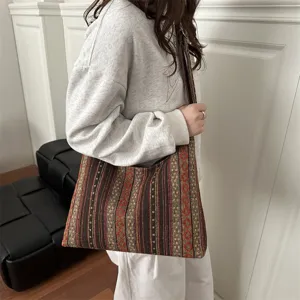 Large capacity ethnic style shoulder tote bag for women, retro woven crossbody bag.