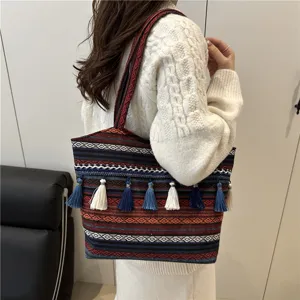 Ethnic style woven tote bag with colorful tassels, large capacity casual shoulder bag.