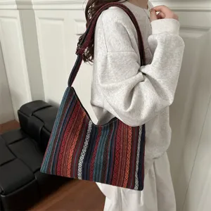 Ethnic style woven shoulder bag for women, retro geometric striped crossbody tote.