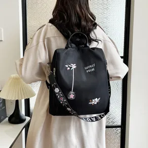 Casual women's black backpack with floral embroidery large capacity daily commuter school bag
