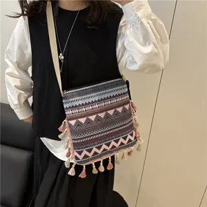 Ethnic style retro shoulder bag with fringe tassels, fashion bohemian crossbody bag for women.