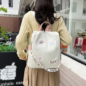 Women casual backpack large capacity daily commuting shoulder bag with embroidered flower design
