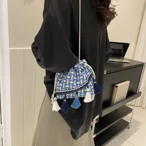 Boho tassel bucket bag for women, blue woven tweed shoulder crossbody bag with cute hanging tassels.