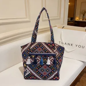 Ethnic woven tote bag for women, vintage style shoulder bag with colorful tassels large capacity.