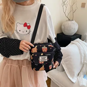 Cute cartoon capybara print canvas crossbody bag, small shoulder bag for women and students.