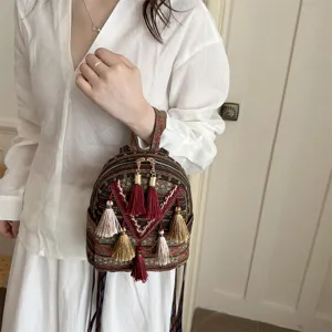 Ethnic woven mini backpack with multi tassels, retro daily casual small shoulder bag for women.