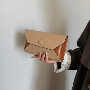 Elegant color block envelope clutch bag for women, stylish evening party accessory.