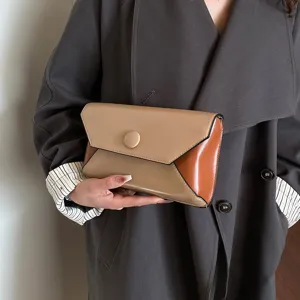 Stylish women colorblock clutch bag, elegant PU leather evening purse for party use.
