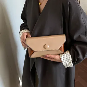 Color-blocking envelope clutch bag for women, minimalist chic leather handbag for evening party.