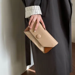 Elegant color-block clutch bag for women, minimalist evening party handbag with button closure.