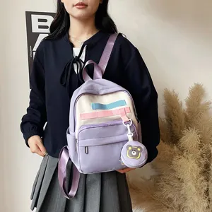Sleek cute purple white school backpack with bear pendant for teenage girls students