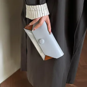 Stylish color-blocked women's clutch bag, elegant design for evening parties and daily use.