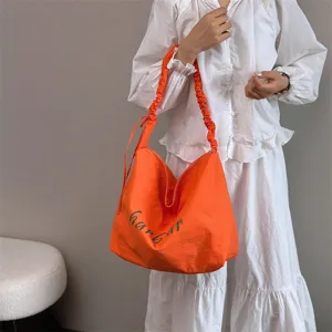 Orange slouchy shoulder bag casual tote handbag for women daily commuting large capacity