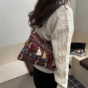 Ethnic style bohemian woven shoulder bag with tassels, retro casual crossbody for daily use.