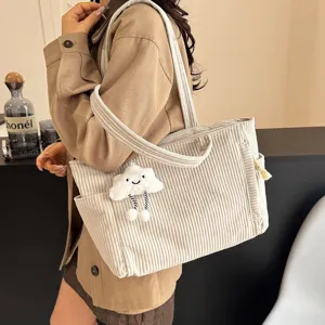 Chic corduroy tote bag for women, large capacity minimalist retro shoulder bag detail view.