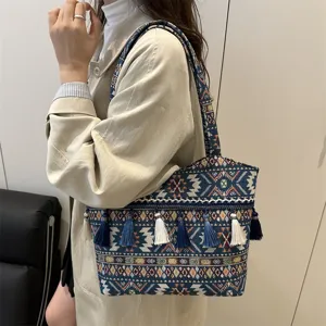 Ethnic style embroidered tote bag with tassels, vintage canvas shoulder bag for women commuter.