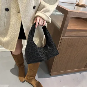 Casual large capacity black leopard print hobo shoulder handbag for daily fashion.